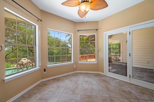 314 Hurst Creek Rd, Lakeway, TX 78734 - tiled spare room featuring healthy amount of natural light, a ceiling fan, and baseboards
