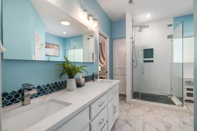 314 Hurst Creek Rd, Lakeway, TX 78734 - full bath with double vanity, a shower stall, marble look tile flooring, and recessed lighting
