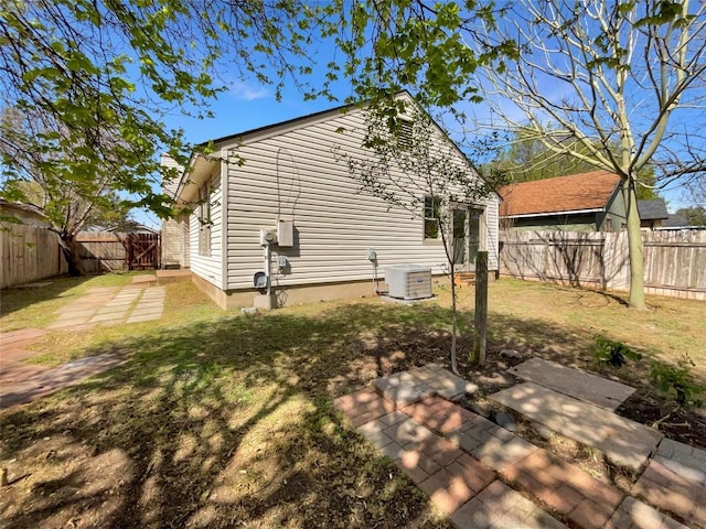 2603 Tracy Trl, Austin, TX 78728 - rear view of property featuring a fenced backyard and a patio area