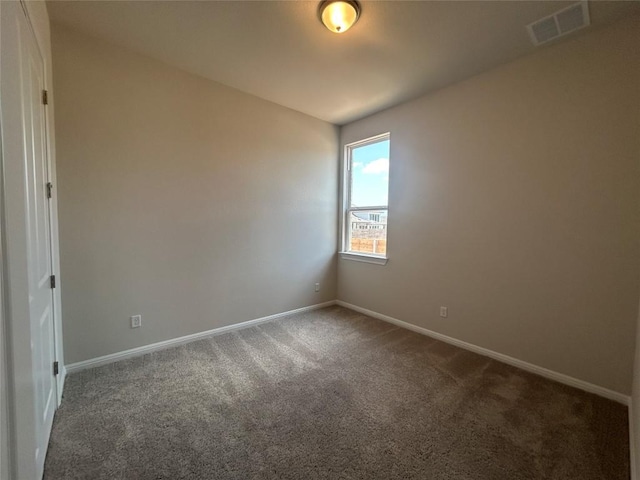 8217 Grenadier Dr, Austin, TX 78738 - unfurnished room featuring dark carpet and baseboards