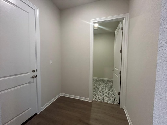 8217 Grenadier Dr, Austin, TX 78738 - hall with dark wood finished floors and baseboards