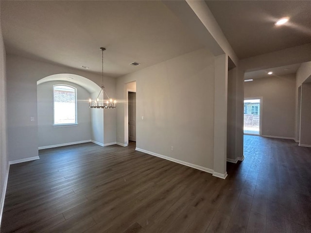 8217 Grenadier Dr, Austin, TX 78738 - unfurnished dining area featuring a chandelier, dark wood finished floors, healthy amount of natural light, recessed lighting, and baseboards