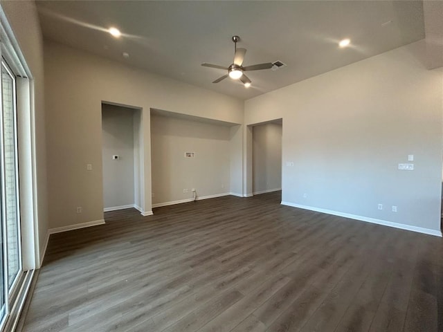 8217 Grenadier Dr, Austin, TX 78738 - unfurnished bedroom with dark wood finished floors, baseboards, and ceiling fan