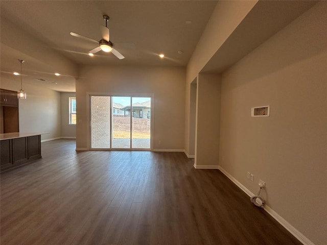 8217 Grenadier Dr, Austin, TX 78738 - unfurnished living room featuring a ceiling fan, dark wood-style flooring, baseboards, and recessed lighting