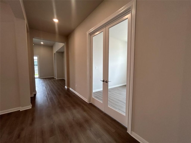 8217 Grenadier Dr, Austin, TX 78738 - hall with french doors, dark wood-type flooring, and recessed lighting