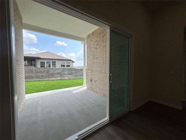 8217 Grenadier Dr, Austin, TX 78738 - entryway featuring wood finished floors