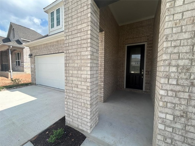 8217 Grenadier Dr, Austin, TX 78738 - entrance to property featuring a garage and brick siding