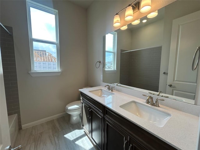 8217 Grenadier Dr, Austin, TX 78738 - bathroom with double vanity and shower / washtub combination