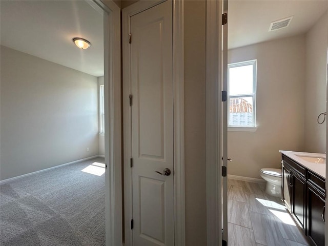 8217 Grenadier Dr, Austin, TX 78738 - bathroom featuring vanity and toilet