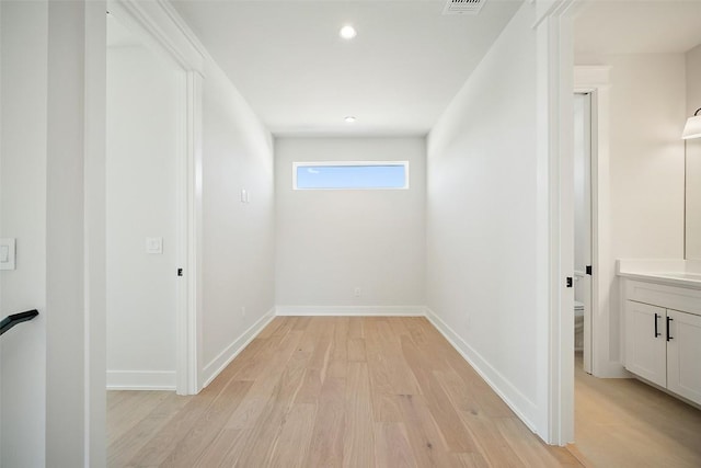 6301 Bristol Cir Unit 1, Austin, TX 78723 - hallway featuring light wood finished floors, recessed lighting, and baseboards