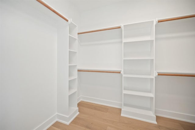 6301 Bristol Cir Unit 1, Austin, TX 78723 - walk in closet with wood finished floors