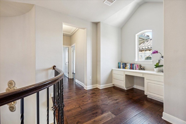 1600 Morning Moon Cir, Austin, TX 78732 - corridor with dark wood finished floors, a desk, attic access, an upstairs landing, and vaulted ceiling