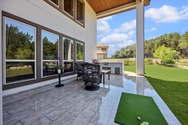 1600 Morning Moon Cir, Austin, TX 78732 - view of patio / terrace with an outdoor kitchen and outdoor dining space