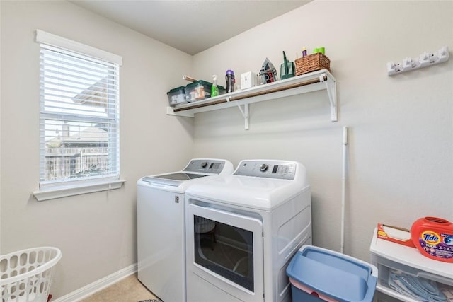 351 Still Hollow Crk, Buda, TX 78610 - laundry room with washing machine and dryer, healthy amount of natural light, and baseboards