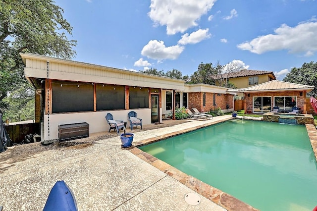 409 Hurst Creek Rd, Lakeway, TX 78734 - view of pool featuring a patio and a pool with connected hot tub
