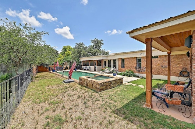 409 Hurst Creek Rd, Lakeway, TX 78734 - view of yard featuring an in-ground hot tub and a patio