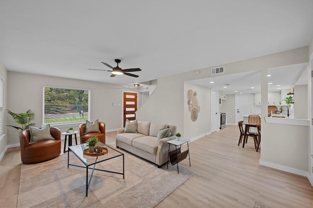 3005 Canter Ln, Austin, TX 78759 - living area with baseboards, light wood-style flooring, ceiling fan, and recessed lighting