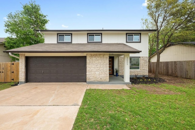 3005 Canter Ln, Austin, TX 78759 - view of front of house with driveway, stone siding, and an attached garage