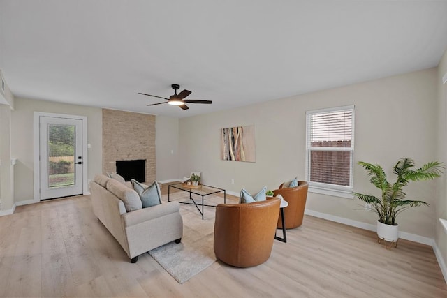 3005 Canter Ln, Austin, TX 78759 - living area with light wood-style flooring, healthy amount of natural light, and a ceiling fan
