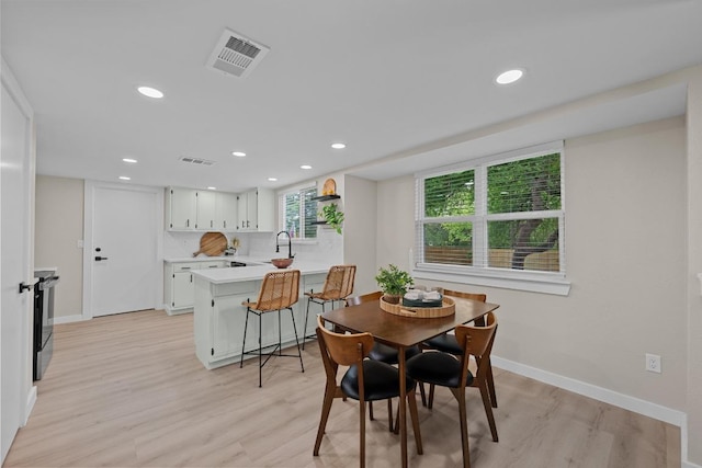 3005 Canter Ln, Austin, TX 78759 - dining area featuring light wood-style floors, recessed lighting, and baseboards