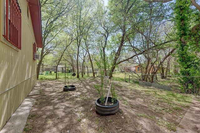 view of yard featuring fence