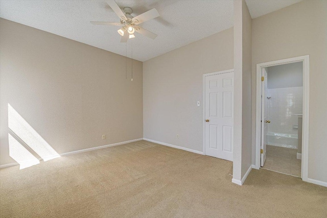 7304 Halbert Dr, Austin, TX 78750 - unfurnished bedroom with light carpet, baseboards, ensuite bath, and ceiling fan