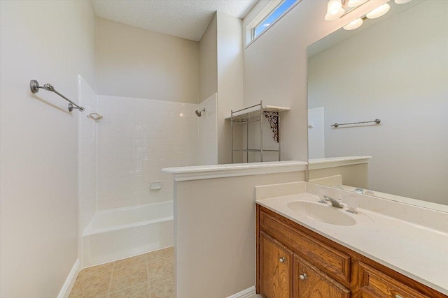 7304 Halbert Dr, Austin, TX 78750 - full bath featuring vanity,  shower combination, and baseboards