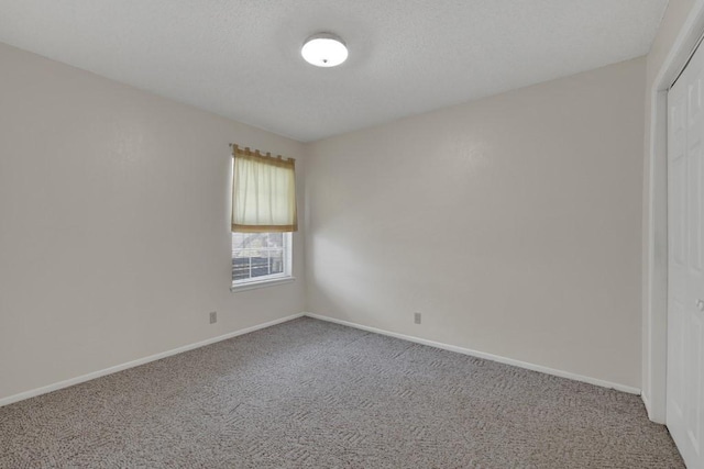 36 Oak Villa Dr # C-2, Canyon Lake, TX 78133 - empty room featuring carpet floors and baseboards