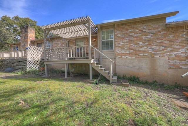 36 Oak Villa Dr # C-2, Canyon Lake, TX 78133 - rear view of house with a pergola, brick siding, a lawn, and a deck