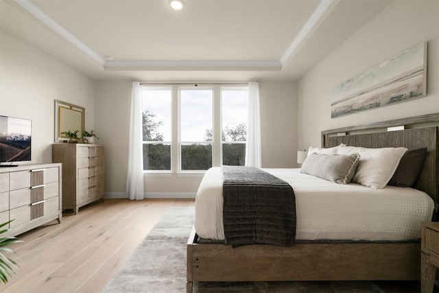 195 Barn Hill Loop, Dripping Springs, TX 78620 - bedroom with a raised ceiling, light wood-style floors, crown molding, baseboards, and recessed lighting
