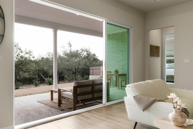 195 Barn Hill Loop, Dripping Springs, TX 78620 - doorway to outside with wood finished floors