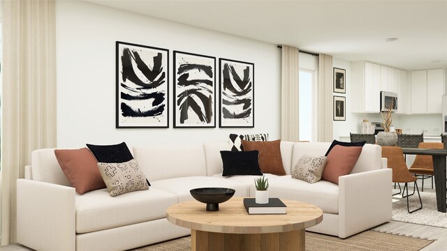 living area featuring light wood finished floors