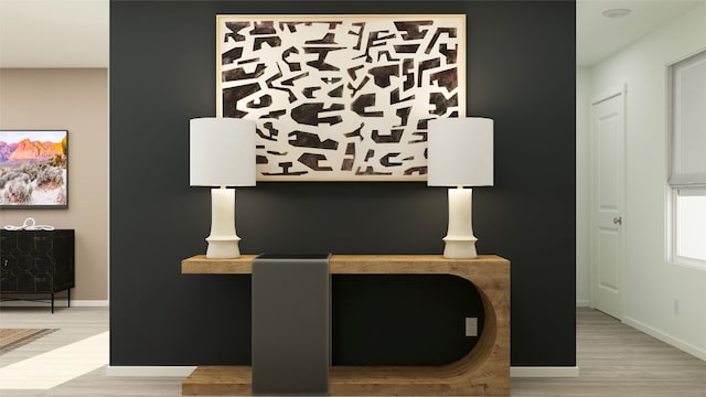 room details with baseboards and wood finished floors