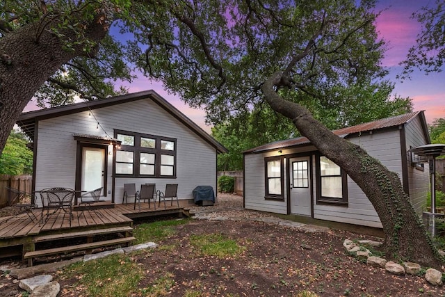 2310 Euclid Ave, Austin, TX 78704 - back of property at dusk with a deck