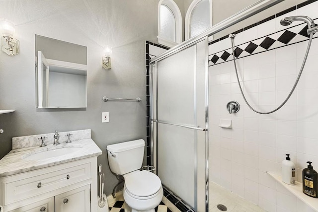 2310 Euclid Ave, Austin, TX 78704 - full bathroom featuring a shower stall, vanity, and a baseboard heating unit