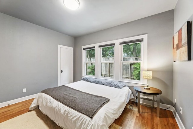 2310 Euclid Ave, Austin, TX 78704 - bedroom featuring wood finished floors and baseboards