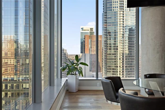210 Lavaca St Unit 2312, Austin, TX 78701 - office area with baseboards, a view of city, and wood finished floors