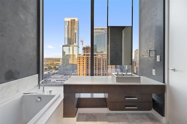 210 Lavaca St Unit 2312, Austin, TX 78701 - full bath featuring a city view, vanity, and a garden tub