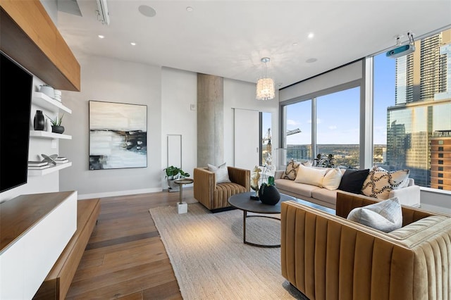 210 Lavaca St Unit 2312, Austin, TX 78701 - living area with baseboards, recessed lighting, and wood finished floors