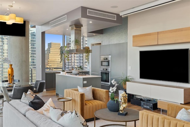 210 Lavaca St Unit 2312, Austin, TX 78701 - living room with light wood-type flooring and visible vents