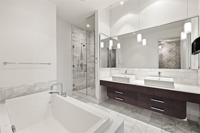 210 Lavaca St Unit 2312, Austin, TX 78701 - full bathroom with a tub, a shower stall, a sink, and marble finish floor