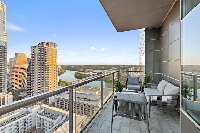 210 Lavaca St Unit 2312, Austin, TX 78701 - balcony featuring a water view and outdoor lounge area