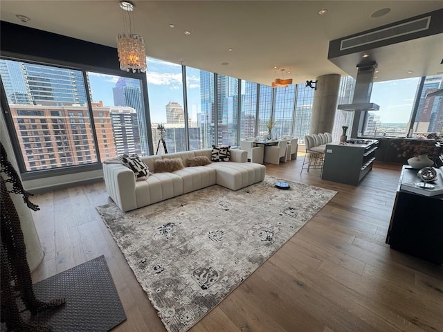 210 Lavaca St Unit 2312, Austin, TX 78701 - living room with a city view, wood finished floors, and a notable chandelier