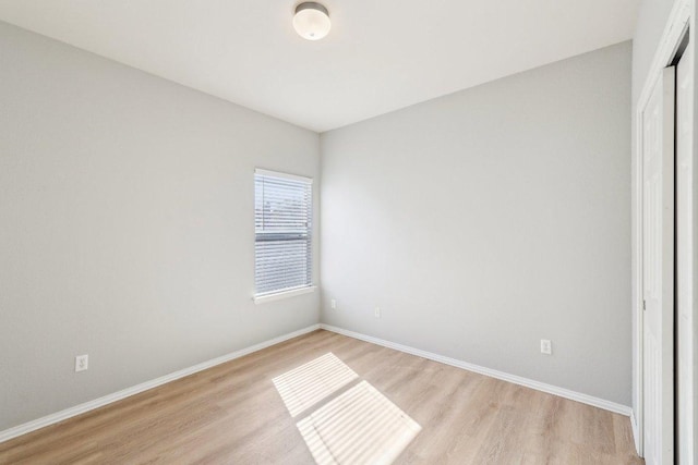 211 Almquist St, Hutto, TX 78634 - spare room with light wood-style floors and baseboards