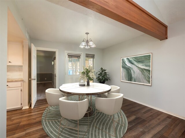 100 Stubblefield Dr, Elgin, TX 78621 - dining area with a chandelier, dark wood-style floors, and vaulted ceiling