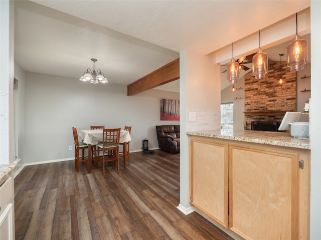 100 Stubblefield Dr, Elgin, TX 78621 - dining room with dark wood-style flooring and a chandelier