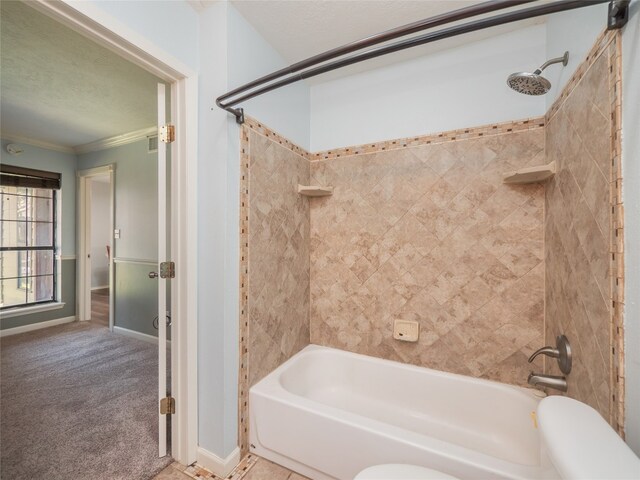100 Stubblefield Dr, Elgin, TX 78621 - bathroom featuring tub / shower combination and ornamental molding