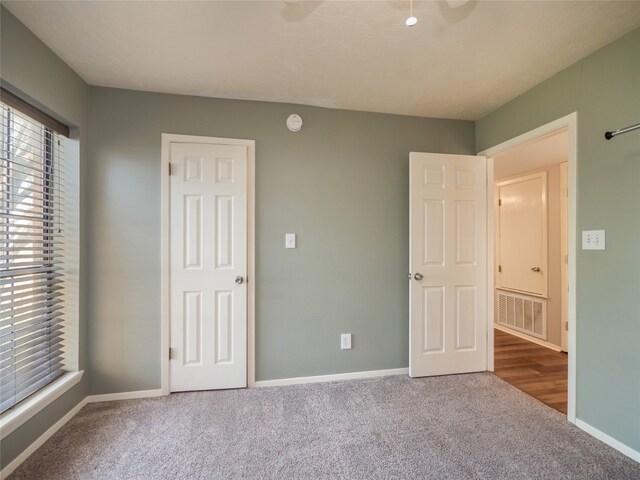 100 Stubblefield Dr, Elgin, TX 78621 - unfurnished bedroom featuring carpet and baseboards