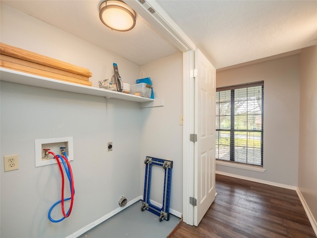 100 Stubblefield Dr, Elgin, TX 78621 - laundry area with washer hookup, dark wood finished floors, and hookup for an electric dryer