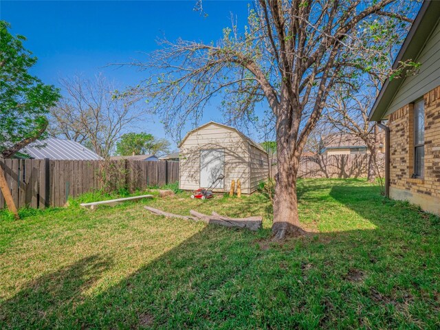 100 Stubblefield Dr, Elgin, TX 78621 - fenced backyard featuring a storage shed